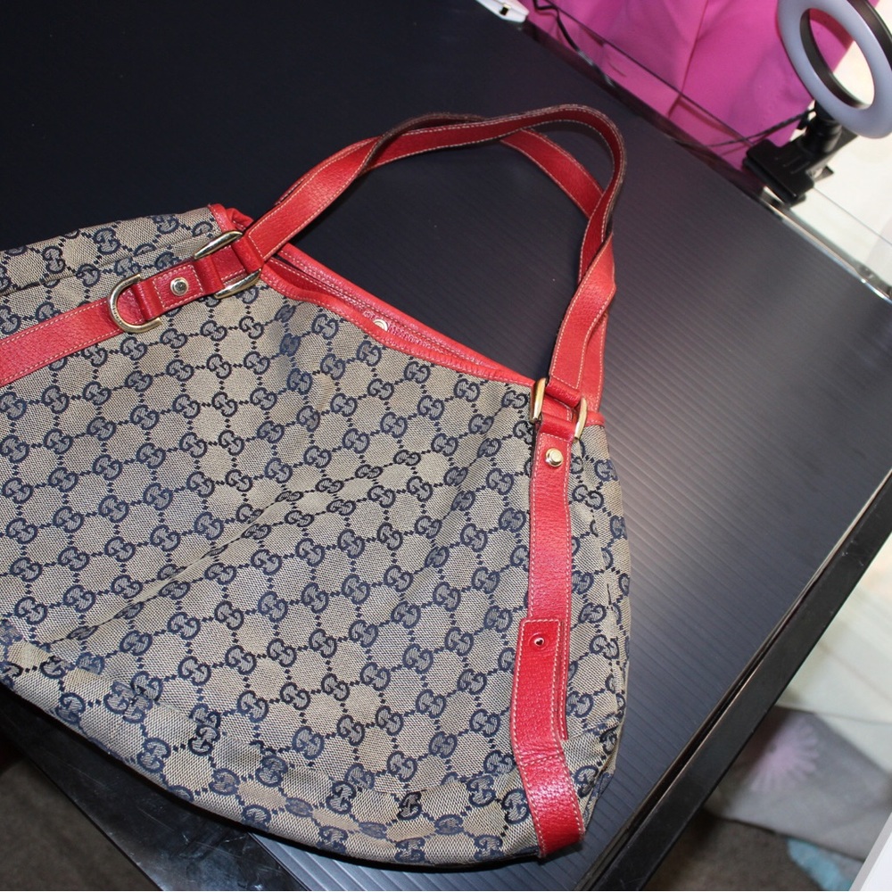 Gucci canvas tote with red leather and gold hardware